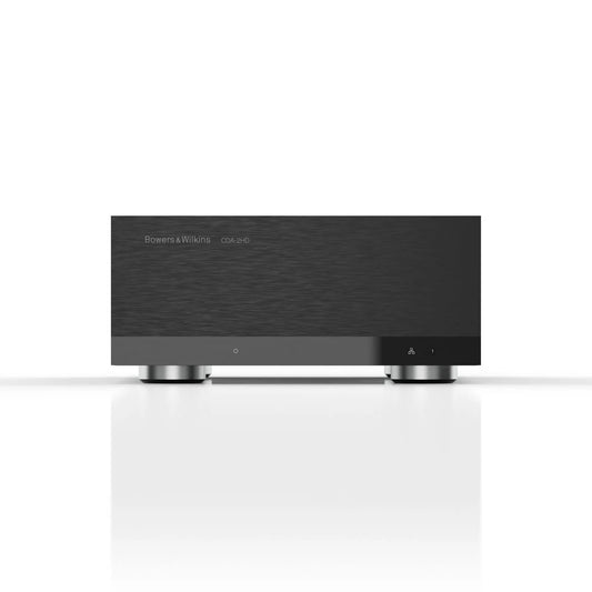 Der schlanke, schwarze Bowers & Wilkins CDA-2HD Verteilerverstärker B-Ware ruht auf einer weißen Oberfläche und bietet ein minimalistisches Design - perfekt für Custom Installation-Lautsprecher-Setups.