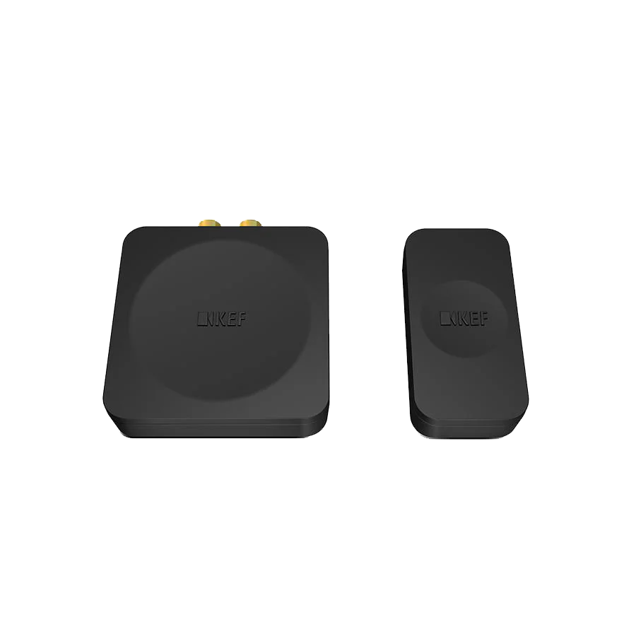 Zwei schwarze, rechteckige KEF KW1 TX/RX System Wireless Subwoofer Adapter Kits mit abgerundeten Ecken nebeneinander auf weißem Hintergrund - ideal für drahtlose Audioübertragung mit einem Kube-Subwoofer.