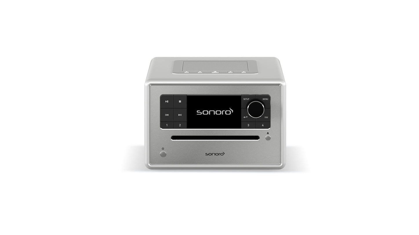 Der Sonoro Elite in hochglänzendem Silber verfügt über ein digitales Display, Bedientasten, Lautstärkeregler, CD-Einschub an der Vorderseite und Bluetooth-Konnektivität für nahtloses Musikstreaming - alles in einem kompakten All-in-One-Musiksystem.