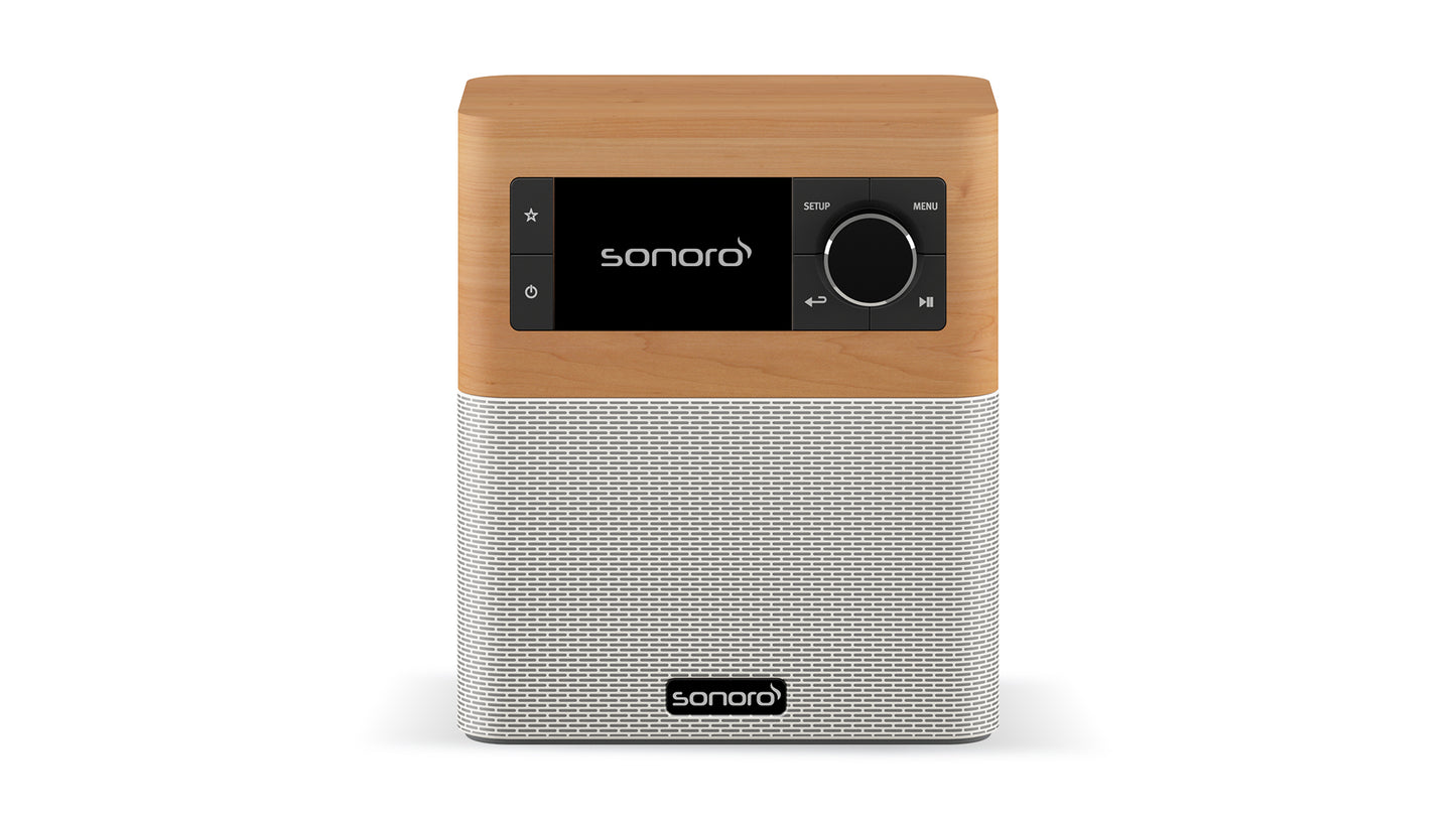 Ein kompaktes Sonoro Stream-Radio in Ahorn (dekor) - Weiß mit einer Holzplatte, schwarzem Digitaldisplay, Bedienknopf und Netz-Lautsprechergitter. Das Sonoro-Logo befindet sich auf dem Display und dem Gitter. Verfügt über DAB+ Digitalradio für hervorragende Klangqualität.