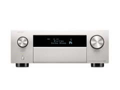 Der Denon AVC-X4800H AV-Receiver in Silber mit HEOS Built-in zeigt "Blu-ray Dolby Atmos" an, verfügt über zwei große Bedienknöpfe, mehrere Tasten unterhalb des Bildschirms und liefert immersiven 3D-Audio.