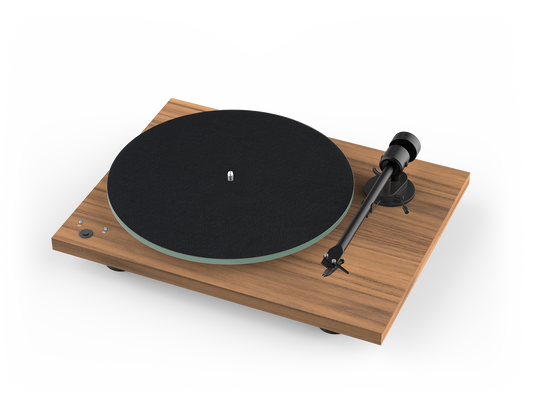Der Pro-Ject T1 Phono SB Plattenspieler in Walnuss mit Holz-Basis, schwarzem Plattenteller und seitlichem Tonarm - perfekt für Vinyl-Liebhaber und Freunde hochwertiger audiophiler Technik.