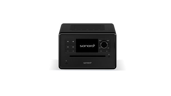 Abgebildet ist ein Sonoro Elite in Schwarz (matt) - Schwarz mit Frontdisplay, Bedientasten, großem Lautstärkeregler, CD-Einschub und 360°-Klangbild vor weißem Hintergrund.