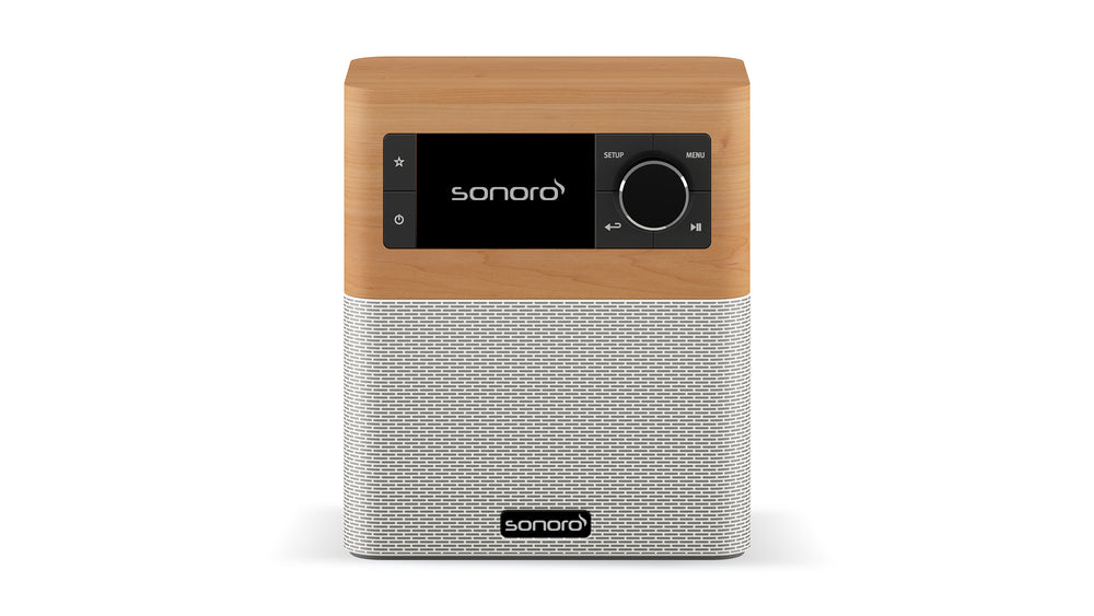 Ein kompaktes Sonoro Stream-Radio in Ahorn (dekor) - Weiß mit einer Holzplatte, schwarzem Digitaldisplay, Bedienknopf und Netz-Lautsprechergitter. Das Sonoro-Logo befindet sich auf dem Display und dem Gitter. Verfügt über DAB+ Digitalradio für hervorragende Klangqualität.